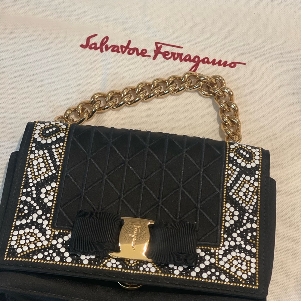 Salvatore Ferragamo Black and White Mosaic Effect line clutch.